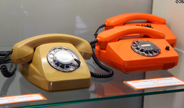 Plastic rotary phones (1980s) at Schleswig Holstein State Museum. Schleswig, Germany.