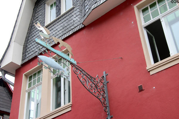 Wrought iron shop sign about fishing. Bacharach, Germany.