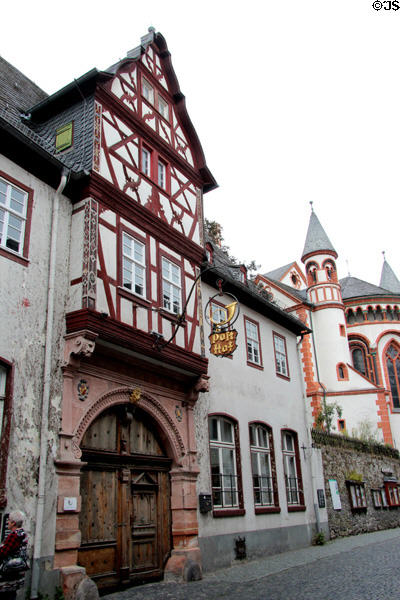 Old half timbered post office & St Peter's Church. Bacharach, Germany.