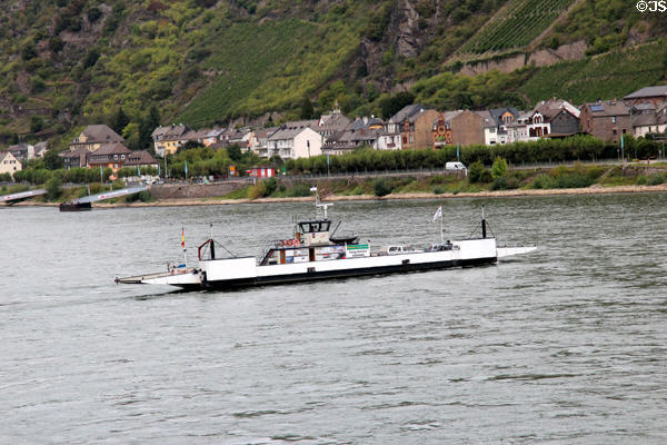 Small barge crossing Rhine River. Kaub, Germany.