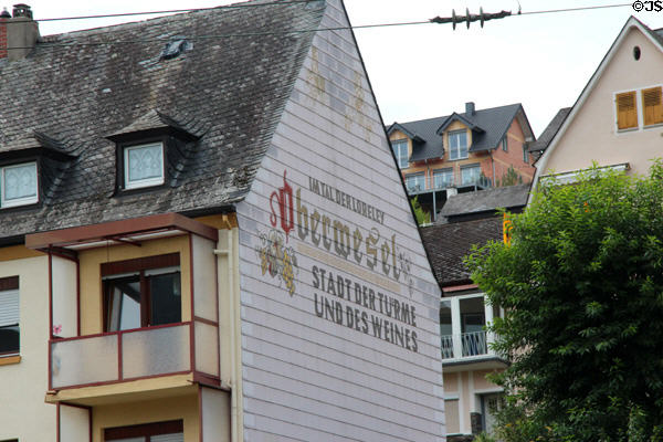Sign noting Oberwesel as the town of towers & wines. Oberwesel, Germany.