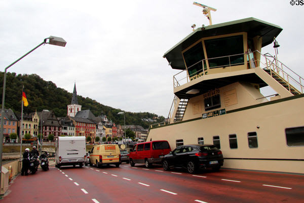 Vehicles lining up to leave car ferry at St. Goar. St. Goar, Germany.