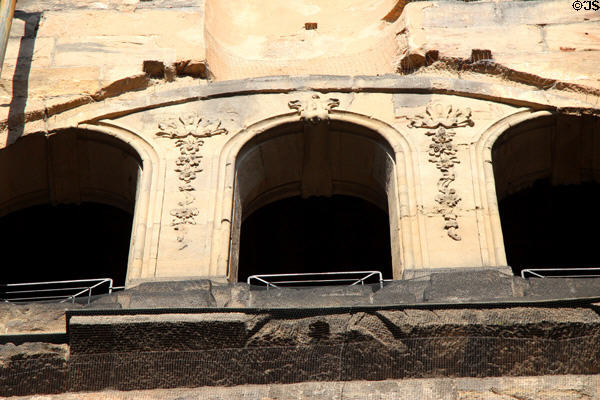 Romanesque arch openings in upper arcade used for defense on Porta Nigra interior. Trier, Germany.