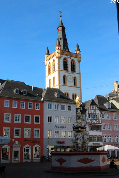 Tower of St Gangolf Church (early 15thC) over Hauptmarkt. Trier, Germany.