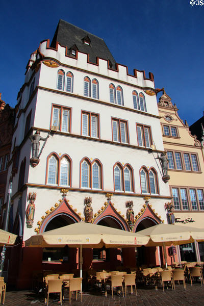 Germanic style building with café at ground level on Hauptmarkt. Trier, Germany.