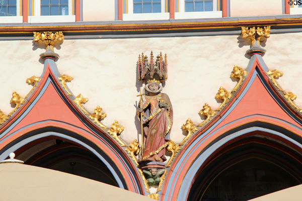 Ornate decorative detail of religious statue on building on Hauptmarkt. Trier, Germany.