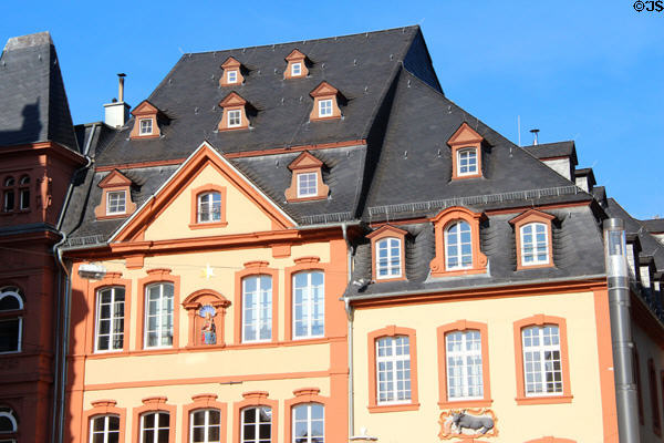 Ranges of dormer windows on stepped roof of building overlooking Hauptmarkt. Trier, Germany.