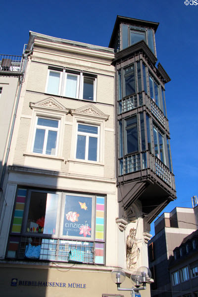 Building with projecting multi-storied porch with carved support. Trier, Germany.