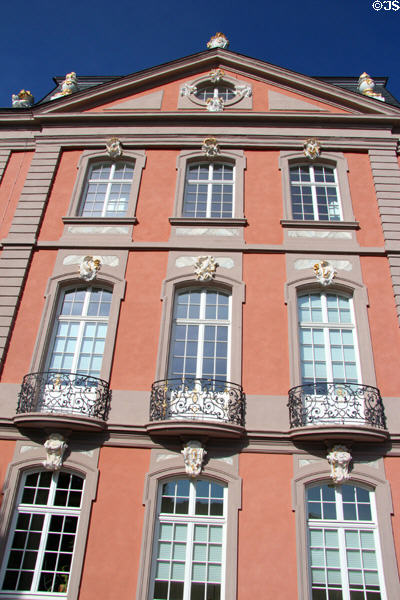 Facade of Kurfürstlicher Palace with ornate wrought iron balconies. Trier, Germany.