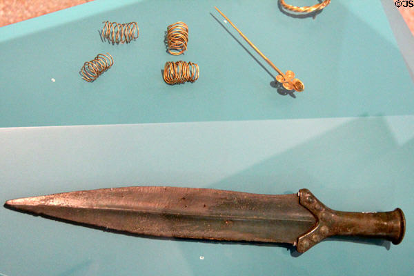 Hoard findings (1600 BCE) including bronze & gold jewelry & short sword at Trier Archaeological Museum. Trier, Germany.