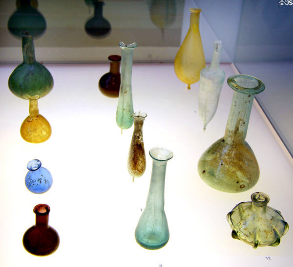 Small Roman glass flasks (1st & early 2ndC) for cosmetics & fragrant oils at Trier Archaeological Museum. Trier, Germany.