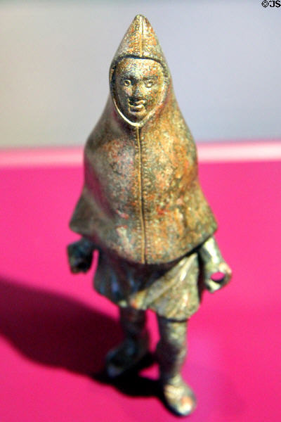 Roman era bronze figurine of man in hooded coat (3rdC) at Trier Archaeological Museum. Trier, Germany.
