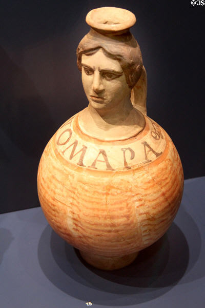 Ceramic vessel with sculpted human face serving as bottle neck (c3rdC) at Trier Archaeological Museum. Trier, Germany.