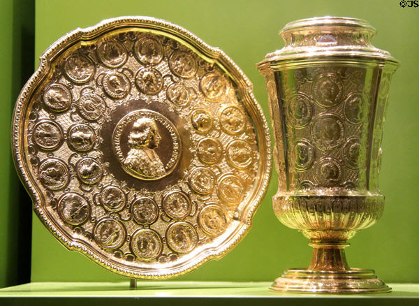 German gold platter (1732) from Augsburg? & beaker from Trier Cathedral (1715) both decorated with medallions at Trier Archaeological Museum. Trier, Germany.