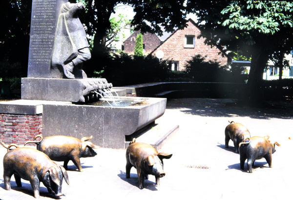 Pig Fountain (Schweinebrunnen). Zons, Germany.