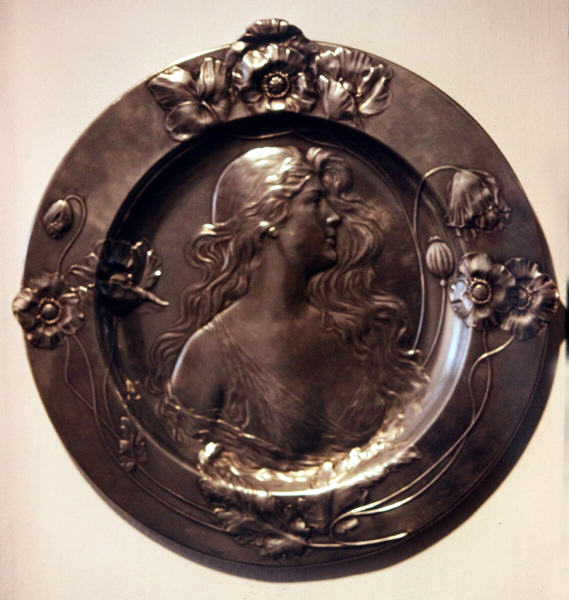 Art Nouveau platter with design of female figure encircled by poppies (1905) by Geislingen from Poppy Art exhibit at Kreismuseum. Zons, Germany.