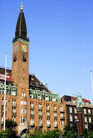 Lute blowers column in City Hall Square and elaborate hotel, Kobenhavn. Denmark.