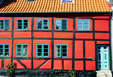 Vibrantly painted house opposite the Church of Our Lady in Nyborg. Denmark.