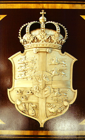 Royal rail carriage coat of arms at the DSB Railway Museum in Odense. Denmark.