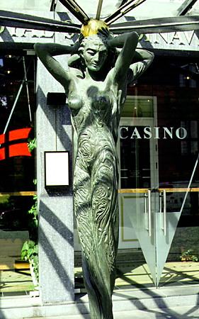 Art noveau sculpture of a woman welcomes you into the casino in Århus. Denmark.