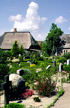 Thatched house and cemetary in Møgeltønder. Denmark.