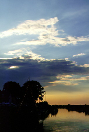 Sunset over the canal in Ribe. Denmark.
