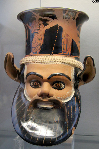 Greek terracotta red-figure drinking vessel in form of head of Satyr (c440 BCE) at Antikensammlungen. Munich, Germany.