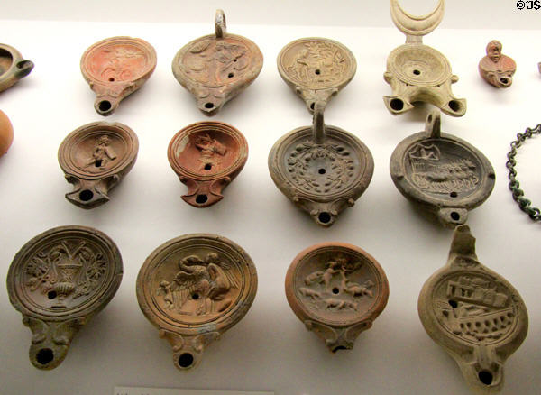 Greek & Roman oil lamps (5thC BCE-3rdC CE) at Antikensammlungen. Munich, Germany.