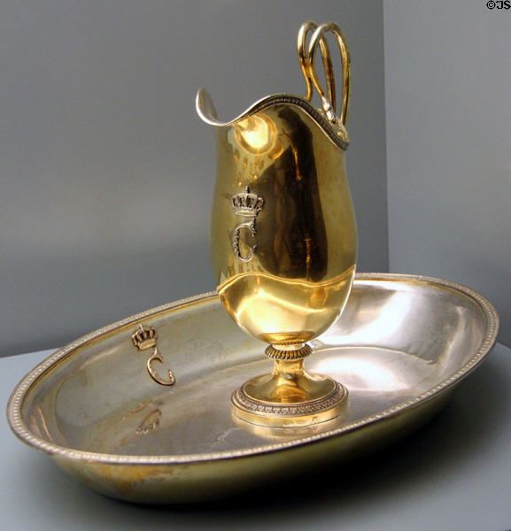 Royal silver & gilded pitcher & wash basin with crest of Queen Caroline (1826) by Johann Alois Seethaler of Augsburg & Louis Wollenweber of Munich at Bavarian National Museum. Munich, Germany.