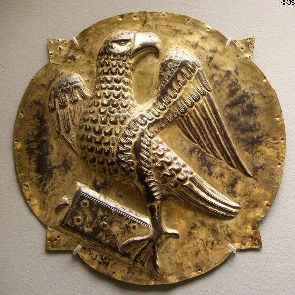 German gilded copper carving of winged eagle symbol of Evangelist St John (15thC) at Bavarian National Museum. Munich, Germany.
