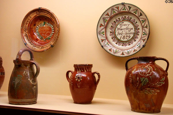 Painted redware ceramic pitchers & bowls (19thC) from upper Franconia at Bavarian National Museum. Munich, Germany.