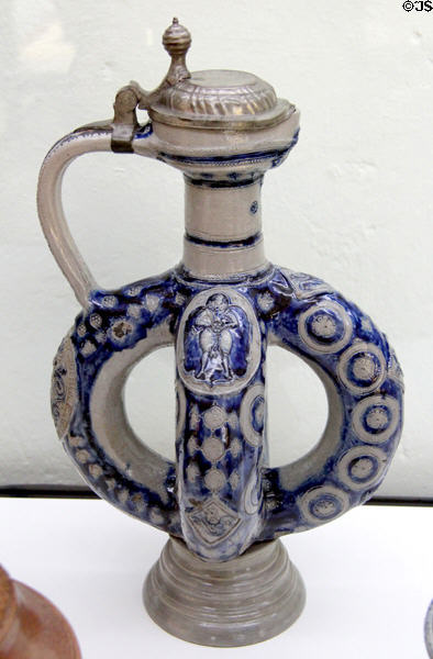 Stoneware covered cobalt blue painted doublering jug (1602) from Raeren at Bavarian National Museum. Munich, Germany.