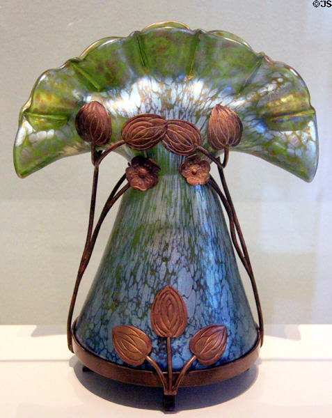 Art Nouveau tulip glass with floral metal mounting (1899) by Johann Lötz Witwe of Klostermuhle, Bohemia at Bavarian National Museum. Munich, Germany.