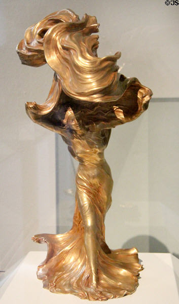 Art Nouveau bronze table lamp in form of veiled dancer Loïe Fuller (1900) by Raoul Larche made by Gießerei Siot-Decauville of Paris at Bavarian National Museum. Munich, Germany.