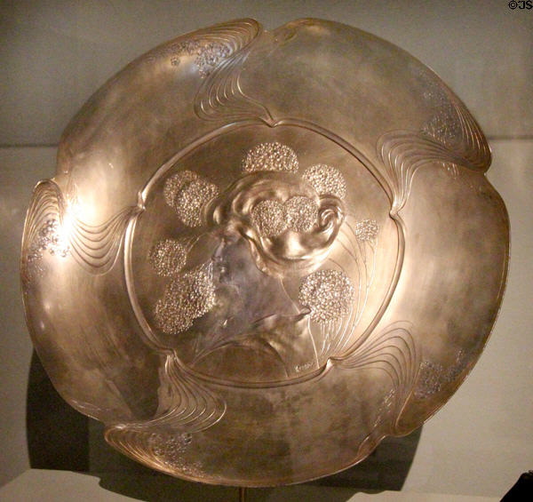 Tin cast & gilded decorative plate with Art Nouveau woman (c1900) by Hermann Gradl d.Ä of Munich made by Orivit-Metallwaren Fabrik of Cologne at Bavarian National Museum. Munich, Germany.