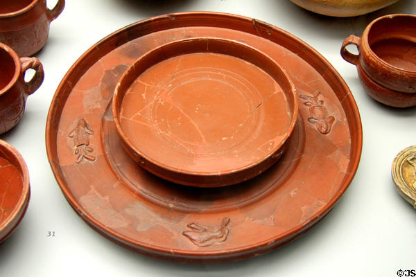 Roman ceramic table setting made in Italy or southern Gaule at Bavarian State Archaeological Collection. Munich, Germany.