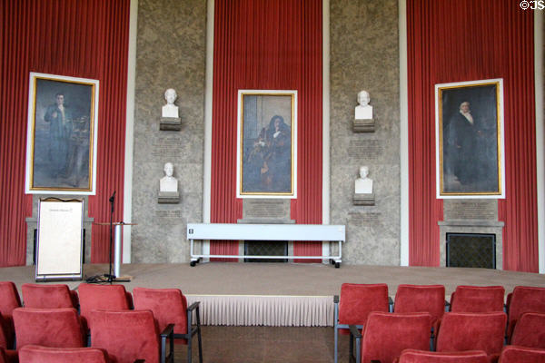 Lecture hall with paintings & busts of German scientists at Deutsches Museum. Munich, Germany.