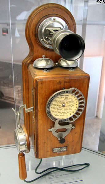 Wall telephone with early dial (1908) by Deutsche Waffen und Munitionsfabriken of Karlsruhe at Deutsches Museum. Munich, Germany.