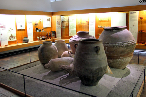 Ceramics display with central ancient pottery vessels at Deutsches Museum. Munich, Germany.