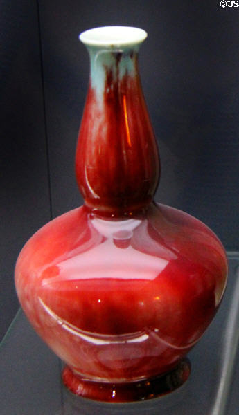 Berlin porcelain vase (c1900) with ox blood color (first produced in Europe by Hermann A. Seger using copper oxide (Cu2O) plus green lip due to copper ions) at Deutsches Museum. Munich, Germany.