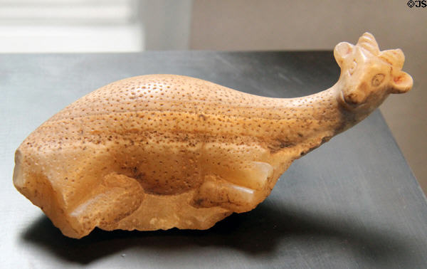 Handle of vessel in shape of reclining gazelle of alabaster (c2950 BCE - early Dynasty 1) from East Delta at Museum Ägyptischer Kunst. Munich, Germany.
