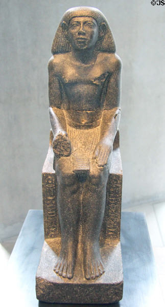 Seated figure of physician Sesheshen-sa-Hathor of granite (12th Dynasty - c1880 BCE) from Ezbet Rushdi at Museum Ägyptischer Kunst. Munich, Germany.