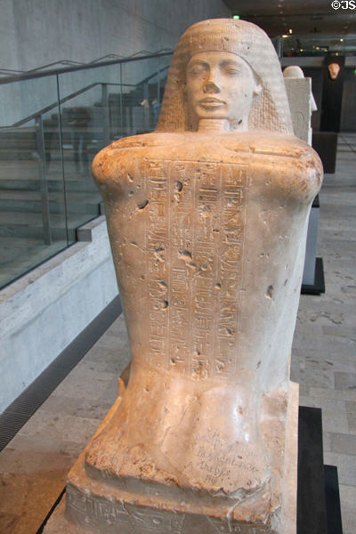 Block statue of High Priest of Amun Bakenkhonsu of limestone (18th Dynasty - c1320 BCE, altered c1220 BCE) from Thebes Karnack at Museum Ägyptischer Kunst. Munich, Germany.