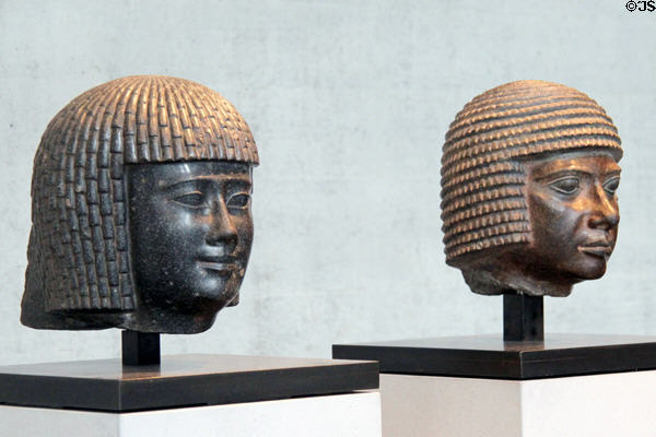 Portrait heads of priest (Ptolemaic Dynasty - 323-30 BCE) & man (4th Dynasty - c2550 BCE) at Museum Ägyptischer Kunst. Munich, Germany.