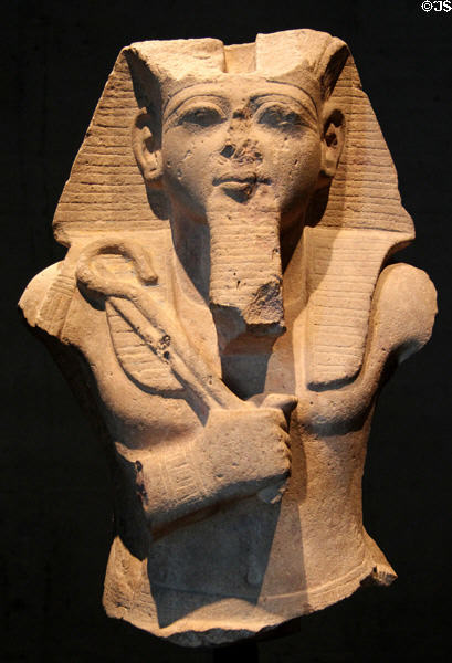 Upper half of seated King Ramses II holding crook & flail of sandstone (19th Dynasty - c1240 BCE) from Nubia at Museum Ägyptischer Kunst. Munich, Germany.
