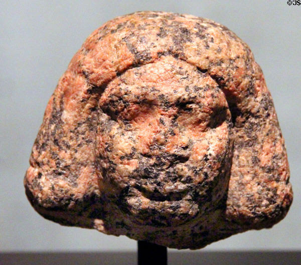 Unfinished head of rose granite (3rd Dynasty - 2700-2600 BCE) at Museum Ägyptischer Kunst. Munich, Germany.