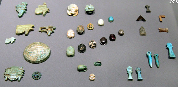 Egyptian amulets of faience, steatite & stone (2000-100 BCE) at Museum Ägyptischer Kunst. Munich, Germany.