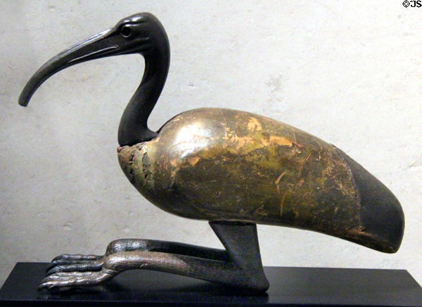 Wood & bronze crouching ibis figure associated with Thoth, god of scribes (400-300s BCE) at Museum Ägyptischer Kunst. Munich, Germany.