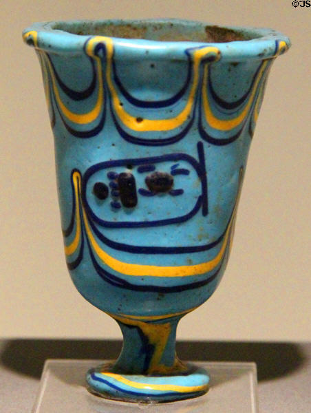 Glass chalice in shape of lotus with name of Pharaoh Thutmose III (18th Dynasty - 1450 BCE) from Thebes at Museum Ägyptischer Kunst. Munich, Germany.