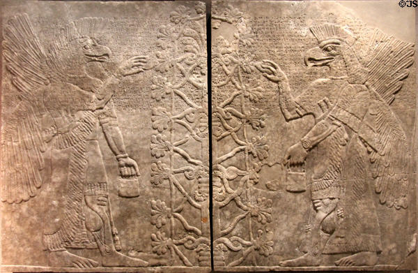 Assyrian Tree of Life being pollinated by two winged genies (c870 BCE) from Nimrud NW Palace of Kings at Museum Ägyptischer Kunst. Munich, Germany.